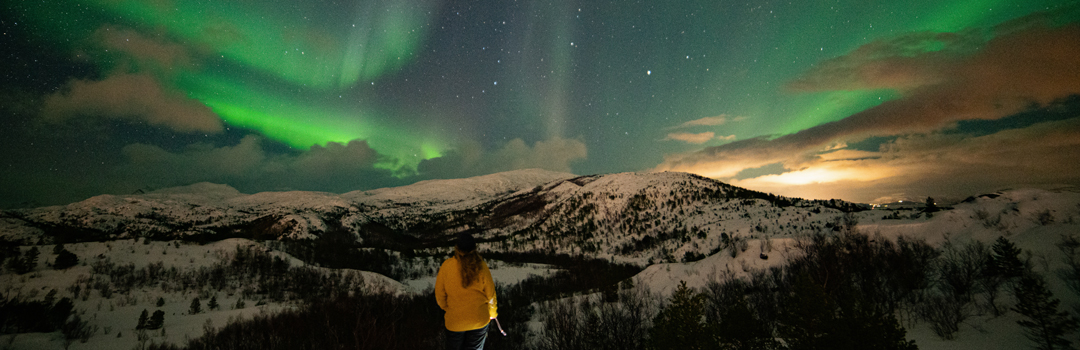 girl northern lights iceland