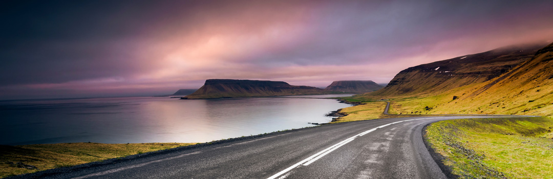 Sunset road trip in Iceland.